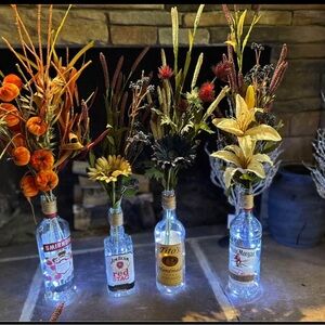 Floral Arrangement in Assorted Bottles